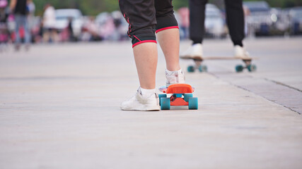 Surf Skate, extreme sport with four wheels on board sliding on street or pumptrack. Famous teenager sport in urban.