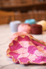 Crochet thread in group as many colors in studio of handicraft school as background. Needles craft on table for hand made hobby.Crochet yarn bag with cotton yarn.