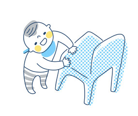 つかまり立ちをする赤ちゃん