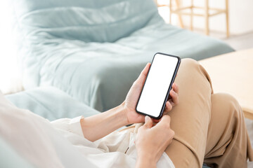 cell phone blank white screen mockup.woman hand holding texting using mobile on desk at office.background empty space for advertise.work people contact marketing business,technology