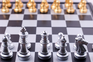 Chess, game of chess or boardd game with many type and charactor. Gold and silver chess. Compeitition on business and education. Strategy concept