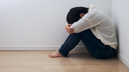 女性・落ち込む