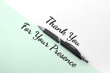 pen with the words thank you for your presence