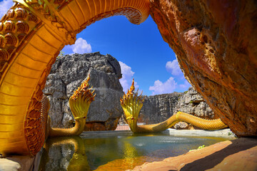 Twin Stucco painted as a large serpent on the mountains at Wat Phu Taphao Thong temple Udon thani province Thailand. Most famous temple.