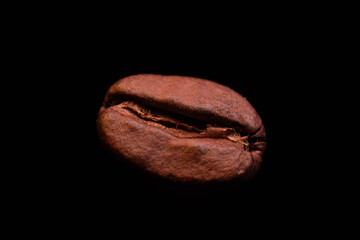 Close-up Macro Coffee Bean isolated on black