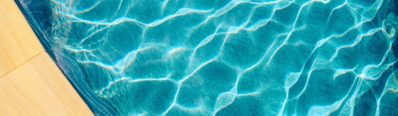 Abstract pool water.  Swimming pool bottom caustics ripple and flow with waves background surface...