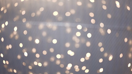 Bokeh of glowing light in the dark. Glittering bright flare luxury lantern light for celebration.