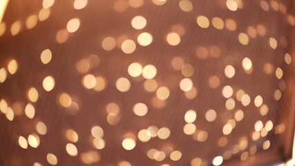 Bokeh of glowing light in the dark. Glittering bright flare luxury lantern light for celebration.