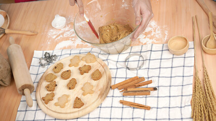 Ginger bread cookies homemade cooking for Christmas traditional dessert. Kids and family love to prepare to make dough and bake them. Then paint them with sugar paste to decor in many colors.