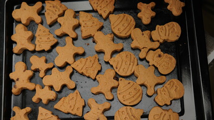 Ginger bread cookies homemade cooking for Christmas traditional dessert. Kids and family love to prepare to make dough and bake them. Then paint them with sugar paste to decor in many colors.