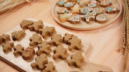 Ginger bread cookies homemade cooking for Christmas traditional dessert. Kids and family love to prepare to make dough and bake them. Then paint them with sugar paste to decor in many colors.