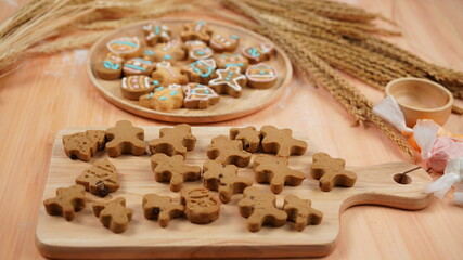 Ginger bread cookies homemade cooking for Christmas traditional dessert. Kids and family love to prepare to make dough and bake them. Then paint them with sugar paste to decor in many colors.