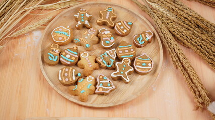 Ginger bread cookies homemade cooking for Christmas traditional dessert. Kids and family love to prepare to make dough and bake them. Then paint them with sugar paste to decor in many colors.