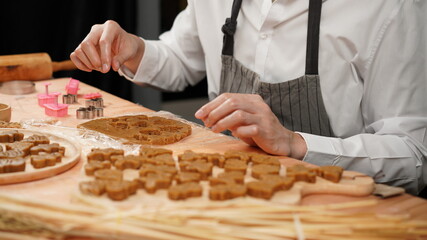 Ginger bread cookies homemade cooking for Christmas traditional dessert. Kids and family love to prepare to make dough and bake them. Then paint them with sugar paste to decor in many colors.