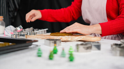 Ginger bread cookies homemade cooking for Christmas traditional dessert. Kids and family love to prepare to make dough and bake them. Then paint them with sugar paste to decor in many colors.