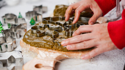 Green ginger bread cookies homemade cooking for Christmas traditional dessert. Kids and family love to prepare to make dough and bake them. Green tea cookies