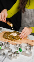 Green ginger bread cookies homemade cooking for Christmas traditional dessert. Kids and family love to prepare to make dough and bake them. Green tea cookies