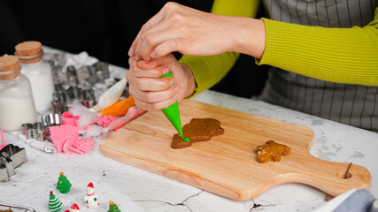 Green ginger bread cookies homemade cooking for Christmas traditional dessert. Kids and family love to prepare to make dough and bake them. Green tea cookies