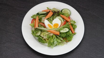 mixed salad with soft-boil egg