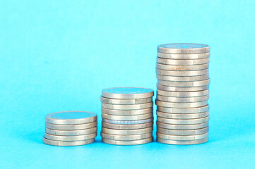 Euro coins on a blue background