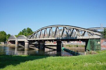 Old Sluice bridge across the Witham in summer