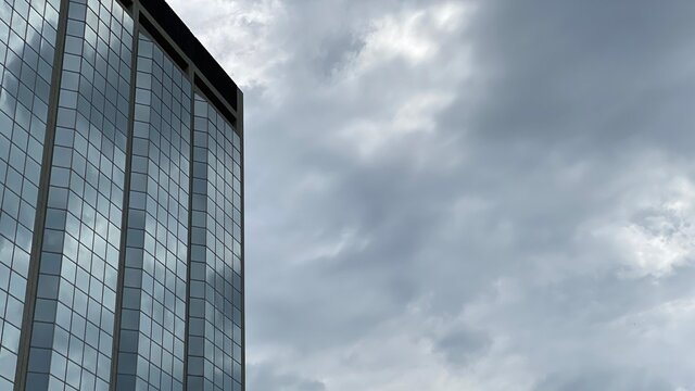 Ominous Clouds Reflected in Corporate Building Windows
