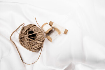 Fototapeta na wymiar Vintage wooden spools of thread for sewing