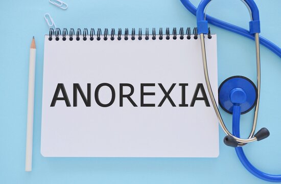 Anorexia text written in Notebook . Concept Image. Anorexia Syndrome.