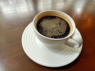 black coffee on wood background