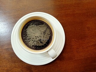black coffee on wood background