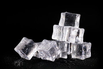 Ice cubes on black background