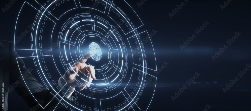 Poster hand pointing at bright glowing fingerprint id interface on dark background.