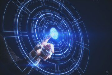 Obraz premium Hand pointing at creative glowing fingerprint ID interface on dark backdrop.