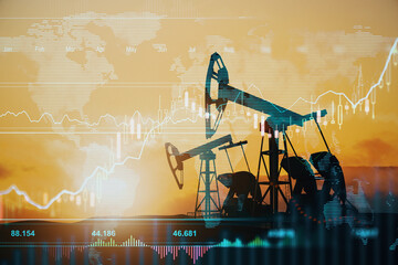 Global stock market and oil industry concept with oil pumps at sunset on abstract field and virtual...