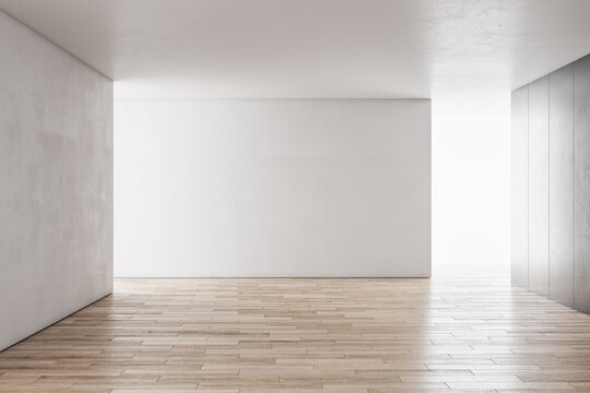 Modern concrete interior with sunlight and empty wall mockup place. Exhibition, art and advertisement concept. 3D Rendering.