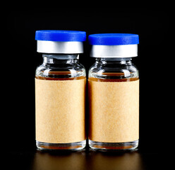 Vaccine medicines on black background