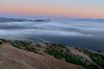 Fog rolling over Salinas Valley via Fremont Peak State Park, Monterey and San Benito Counties, California, USA.