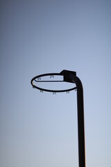 Netball/basketball hoop against blue sky © The Broccoli