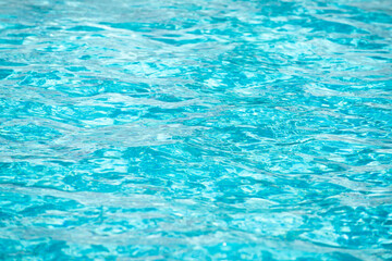 Water in swimming pool, background with high resolution. Wave abstract or rippled water texture.
