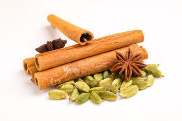 Indian spices and herbs on white background.
