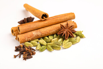 Indian spices and herbs on white background.