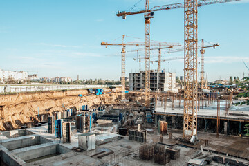 Construction and construction of high-rise buildings, the construction industry with working equipment and workers. 
