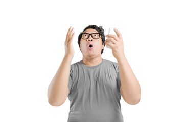 Fototapeta premium Asian man in eyeglasses with shocked expression