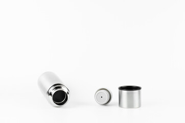 Metal thermos made of stainless steel. On white background. Thermos cup.