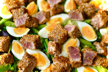 healthy tuna salad with wild asparagus, eggs and avocados. The tuna was coated with soy sauce, sesame seeds and cooked very quickly. So good !