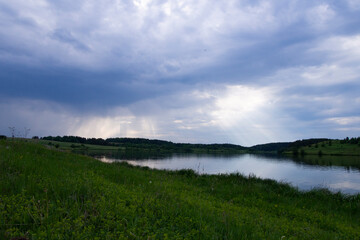 Stormy sky over the Sinyachikha River in the Sverdlovsk region (Ural, Russia)