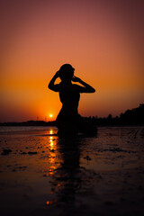 Beatiful silhouette of woman in Sunshine
