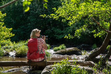 Woman taking photos with camera