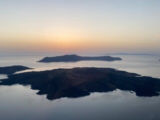 Obraz premium sunset in Santorini, helicopter view, vulcano
