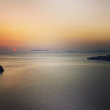 sunset on Santorini, Greece, helicopter view © Anna